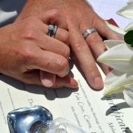 Signing at Beach Wedding with Cairns Civil Marriage Celebrant, Melanie Serafin
